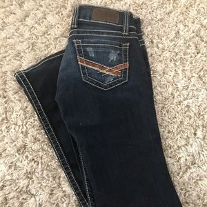Buckle boot cut jeans.
